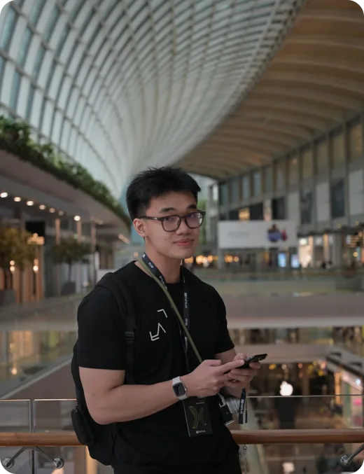Cyberk team member inside a glass atrium